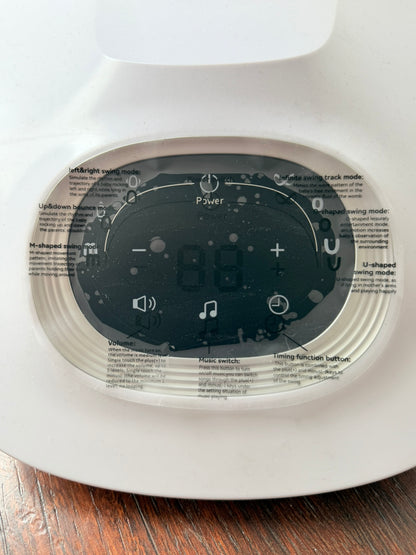 Columpio eléctrico para bebés Momcozy