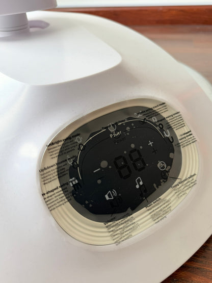 Columpio eléctrico para bebés Momcozy
